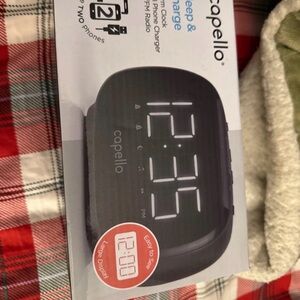 Copello Black Dual Phone Charger with FM Radio